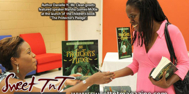 Author Danielle YC Mc Clean greets featured speaker Marsha Gomes-Mckie at lauch of children's book The Protector's Pledge, Literature, Sweet T&T, Sweet TnT, Trinidad and Tobago, Trini, vacation, travel, authors