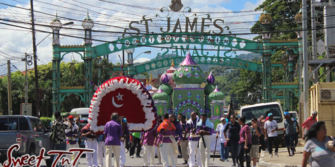Hosay Muslim men parade in St James in Sweet T&T, Sweet TnT, Trinidad and Tobago, Trini, Travel, Vacation, Tourist, Hosay, Muslim, Parade, Tomb, Drummers, Funeral Procession, Woodbrook, St James, St Clair, Palm, Dancing the moon, Tadjahs, Moons, Tadjahs, mosques, Hussein, Hassan, tombs, tassa side, two moons, Husayn, Hassan
