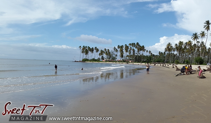 Icacos at the end of Trinidad 5 Icacos shore trees people blue sky by Marika Mohammed for story Icacos end of Trinidad in Sweet T&T, Sweet TnT, Trinidad and Tobago, Trini, vacation, travel