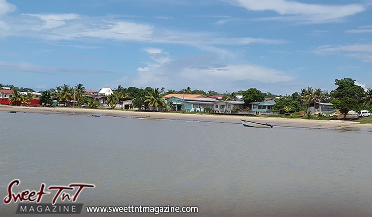 Icacos water shore blue sky houses boat by Marika Mohammed for story Icacos end of Trinidad in Sweet T&T, Sweet TnT, Trinidad and Tobago, Trini, vacation, travel