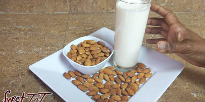 Almond milk glass, bowl, tray of almondsalso for food fraud article in sweet T&T for Sweet TnT Magazine, Culturama Publishing Company, for news in Trinidad, in Port of Spain, Trinidad and Tobago, with positive how to photography.