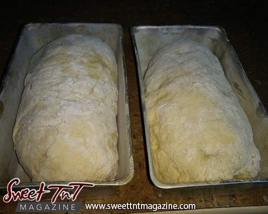 Dough in pan ready to bake bread homemade in sweet T&T for Sweet TnT Magazine, Culturama Publishing Company, for news in Trinidad, in Port of Spain, Trinidad and Tobago, with positive how to photography.